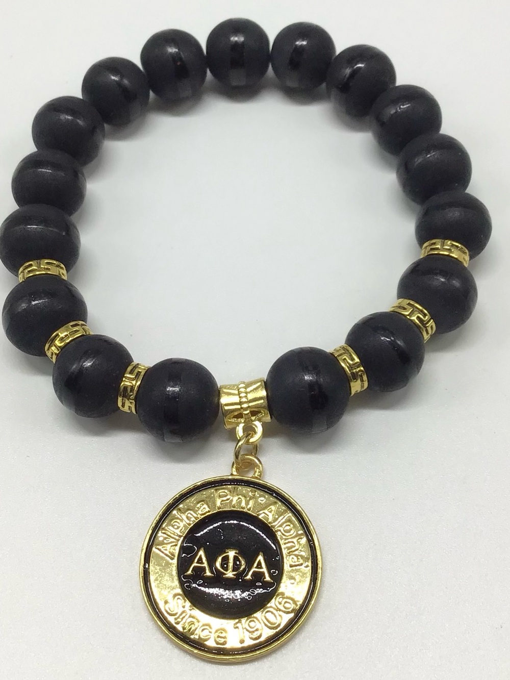 Alpha Phi Alpha Black Beaded Bracelet with Gold Charm